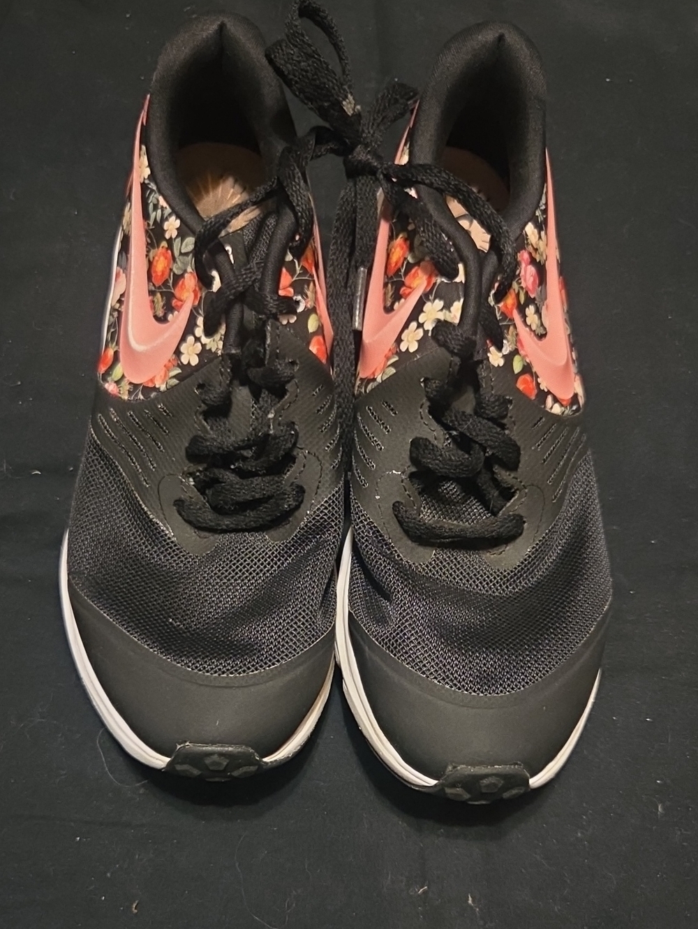 Nike Women’s Black Running Shoes with Pink Floral Swoosh